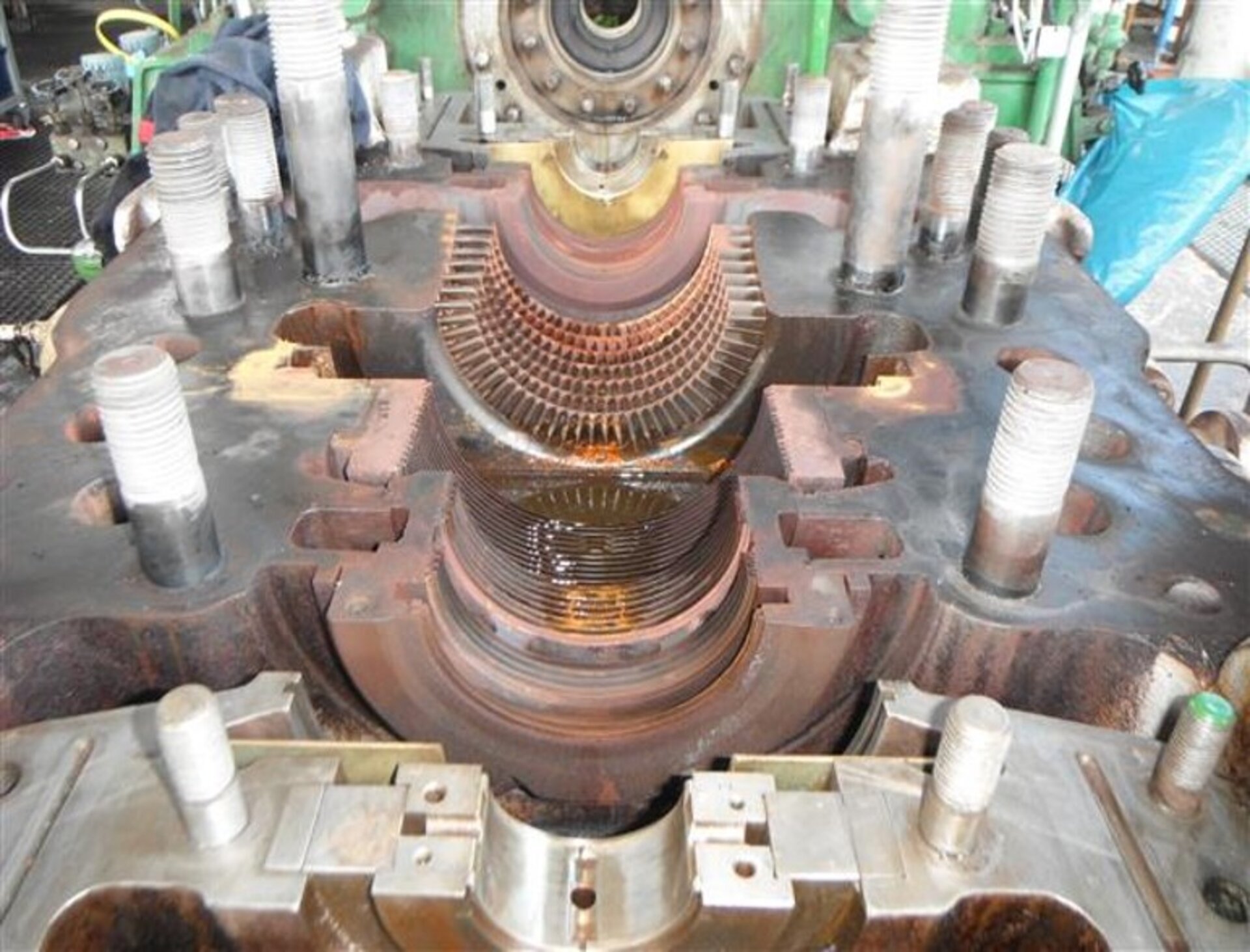 Detailed view of an open turbocompressor casing, revealing the intricate internal structure and blades.